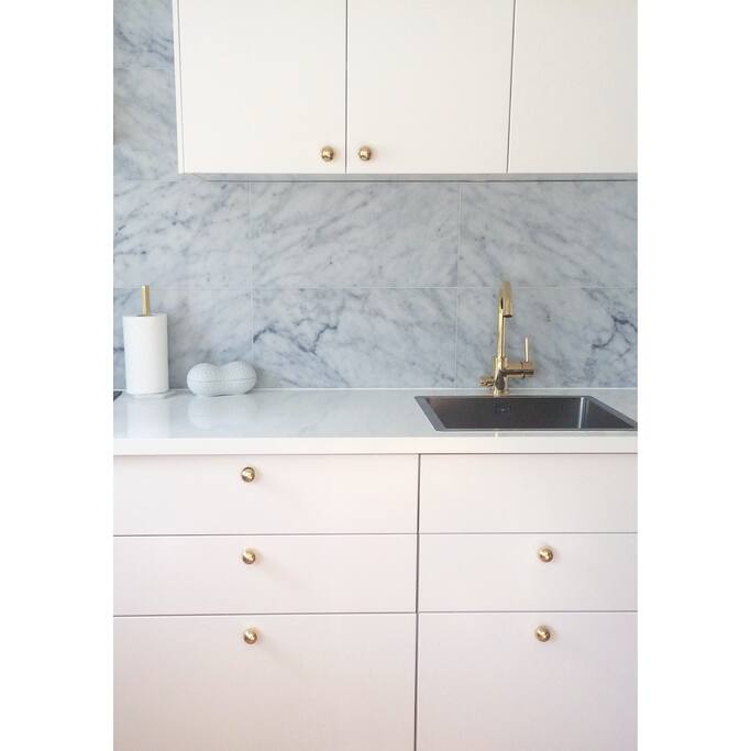Details in brass and marble.