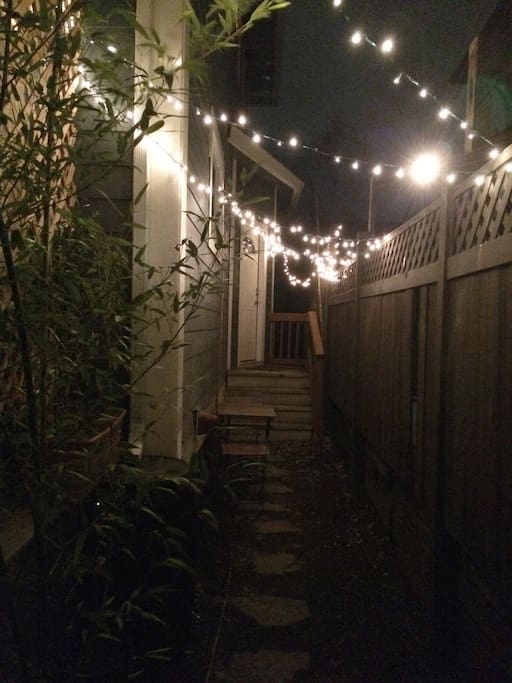 Your outdoor space all lit up controlled with a switch by the entryway door.