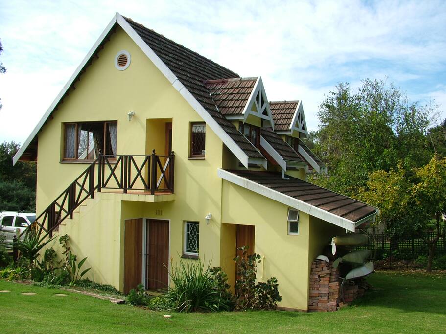 Built to a Swiss architectural style with red geraniums planted in window boxes below large dormer windows.