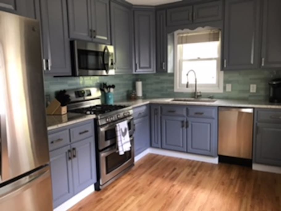 Updated kitchen with Keurig, double oven, dishwasher, refrigerator, and microwave