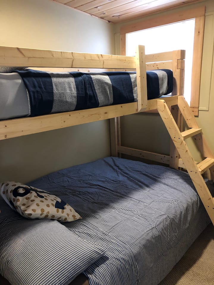 Second bedroom includes a bunk bed with a double on the bottom and single on top. 
