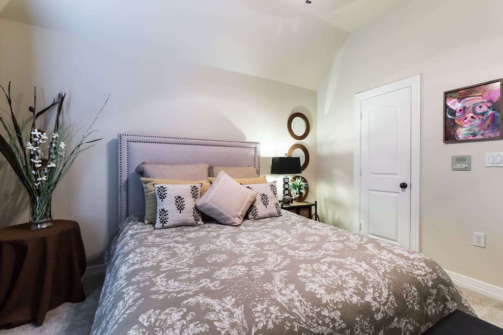 Relax in a queen size bed and flat screen TV.
