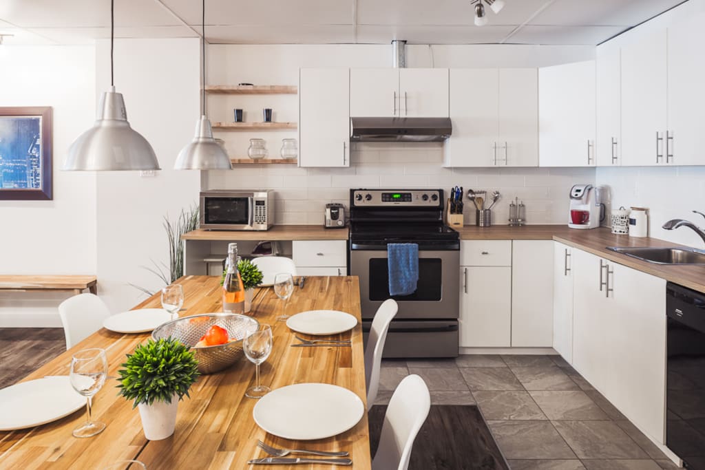 Fully equipped kitchen with Keurig coffee machine and cups