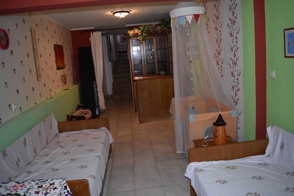 Lower level bedroom. Two beds + an additional drawer bed + a craddle + a bar