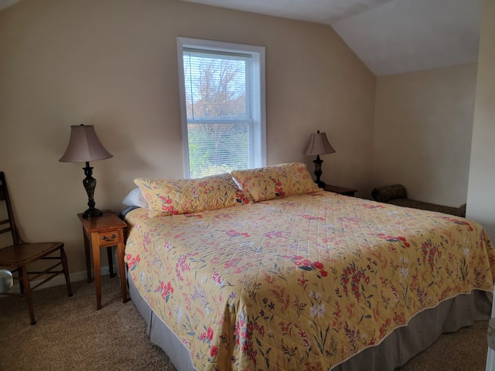 King bedroom upstairs 
With a smart TV in room. 