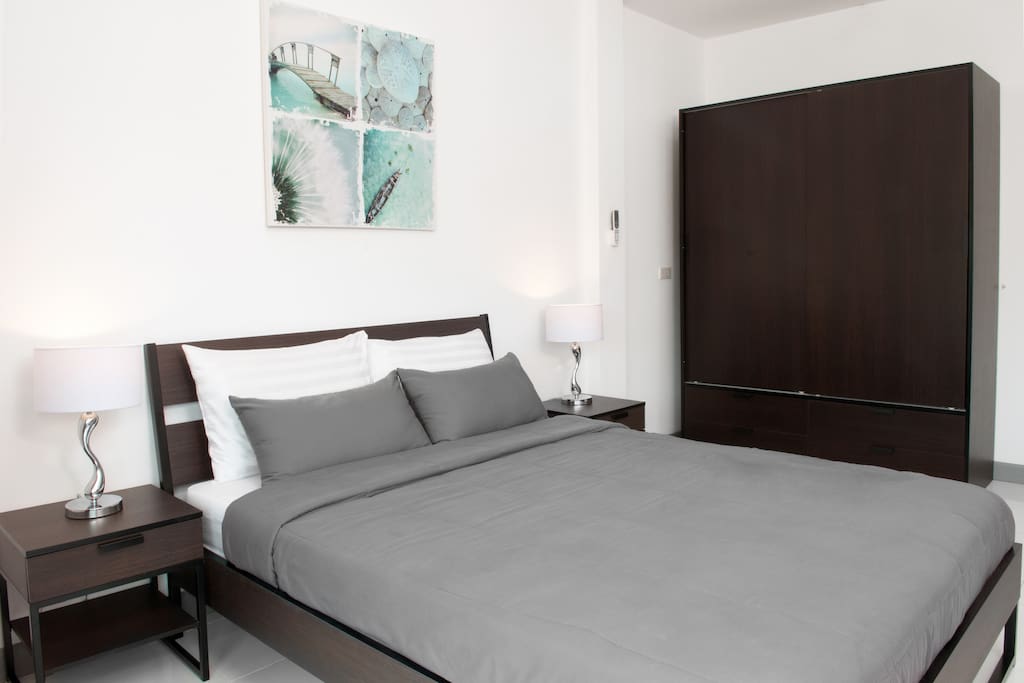 Very good quality spring mattress with soft cotton sheets. Extra large wardrobe with lockable drawer for valuables.