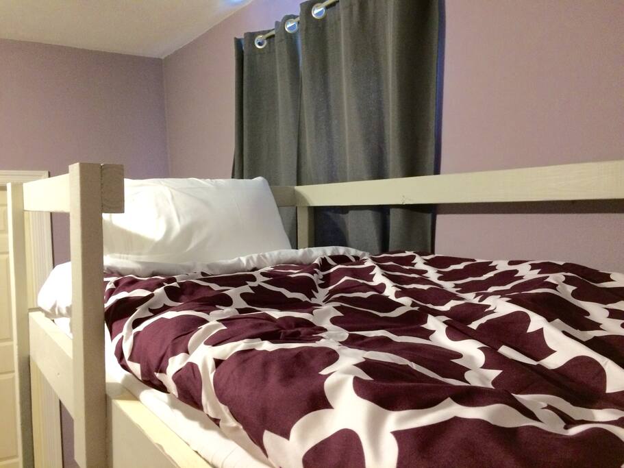 Your bed is the top bunk (T1).