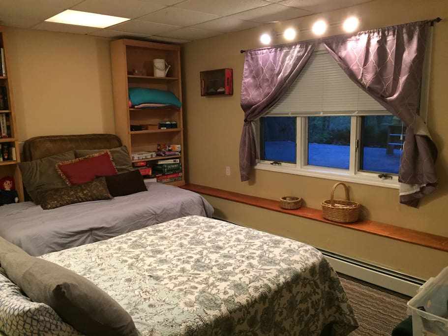 Back room sleeps 2-3 people and looks out on the back yard.