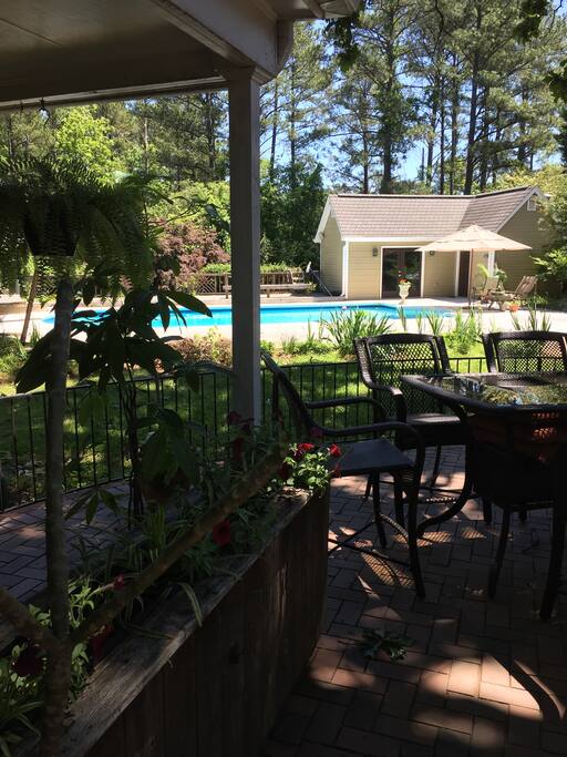 Spanish style garden outdoor eating area.