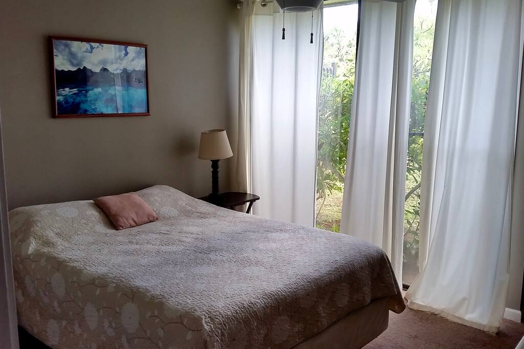 Bedroom with closet, AC, smart TV, queen bed