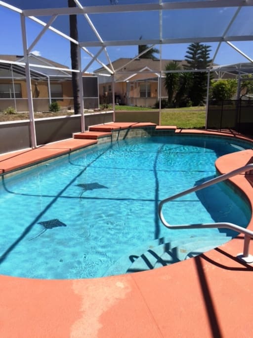 Large pool with large deck. Pool had been resurfaced and re-tiled.