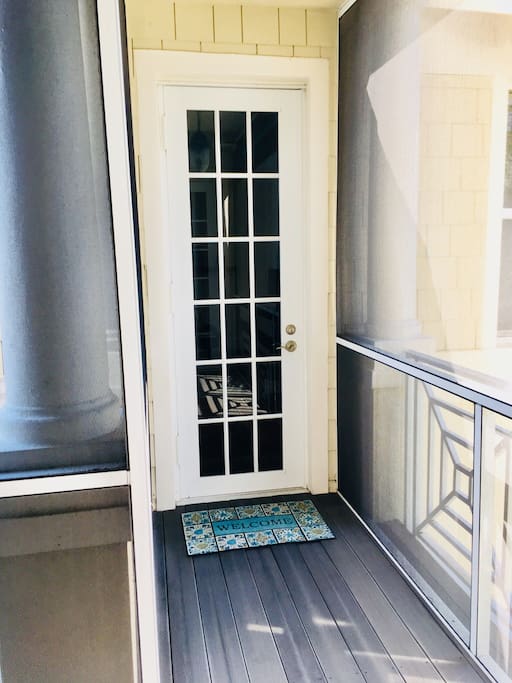 Private, screen enclosed entrance to detached guest house.