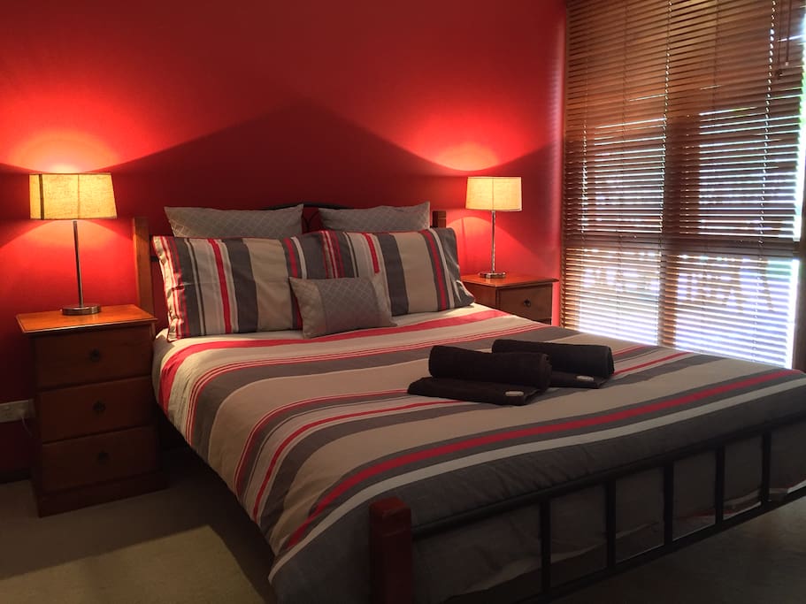 Queen Bedroom with direct access to the deck.