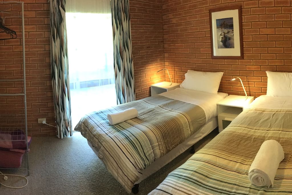 Two comfortable single beds in the 2nd bedroom