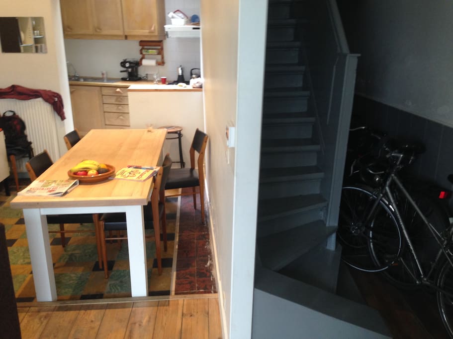 Kitchen on the left, stairs to the upper floors on the right