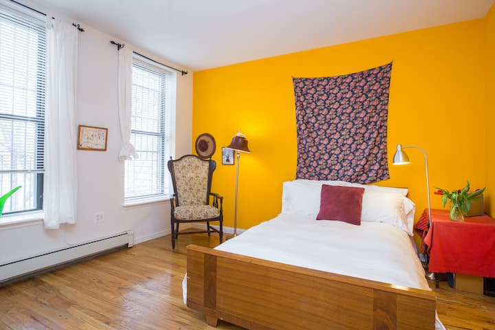 Bedroom- has a view over backyard trees