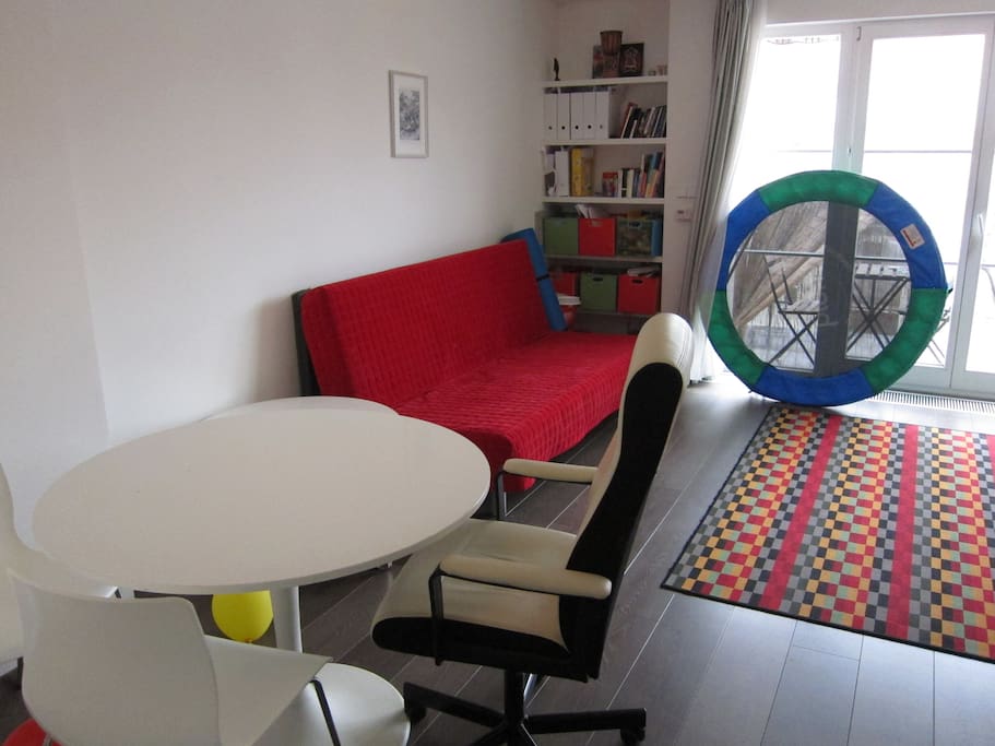 Sofa bed, comfortable desk chair (there's also a desk in the bedroom)