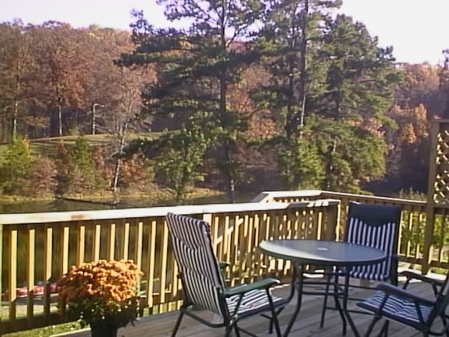 A secluded deck overlooks the pond