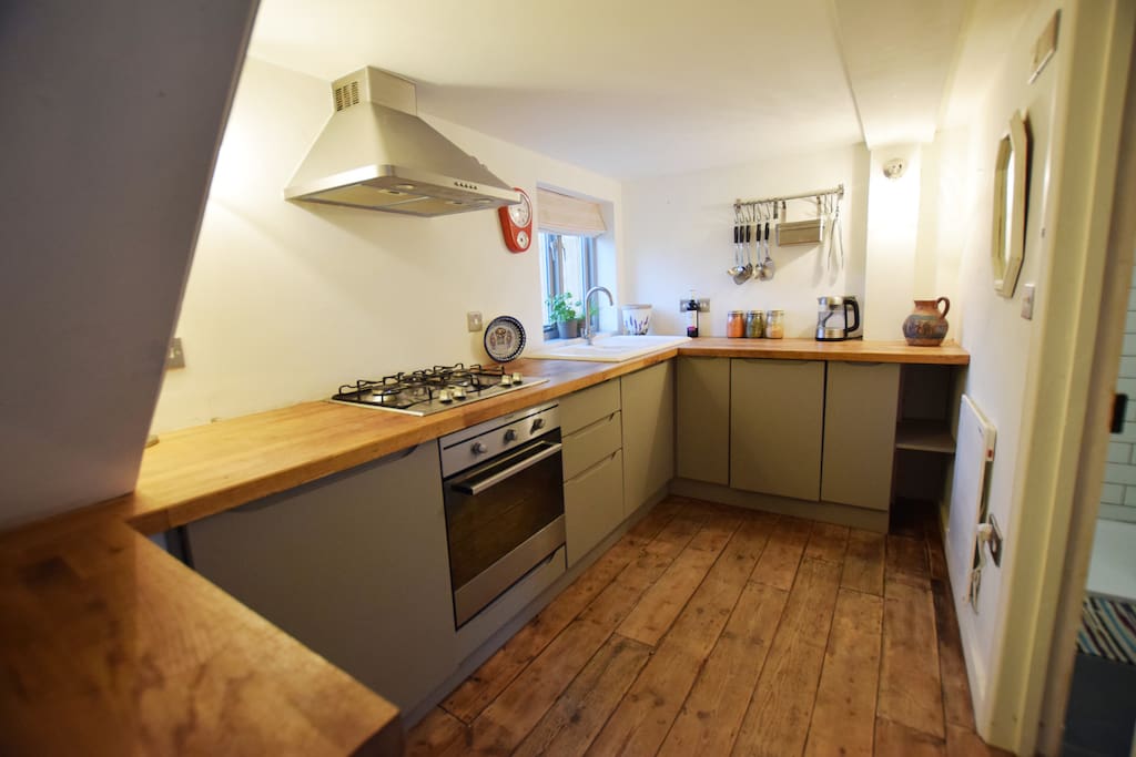 The kitchen with dishwasher, gas hob & elec oven.