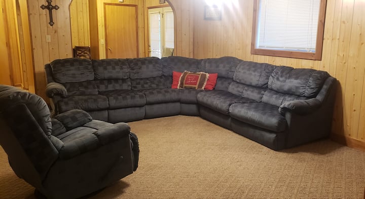 Sleeper sofa on right and 2 reclining seats on left. Left recliner has cord to plug in for massage. Swivel rocker also reclines.