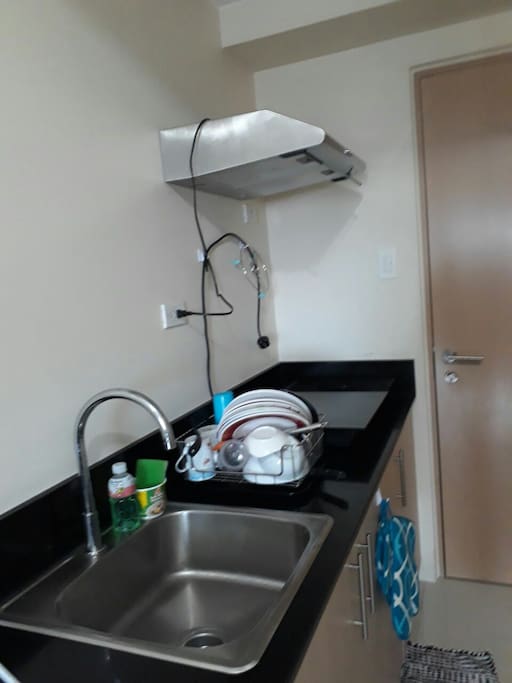 *kitchen area* for cooking and washing dishes