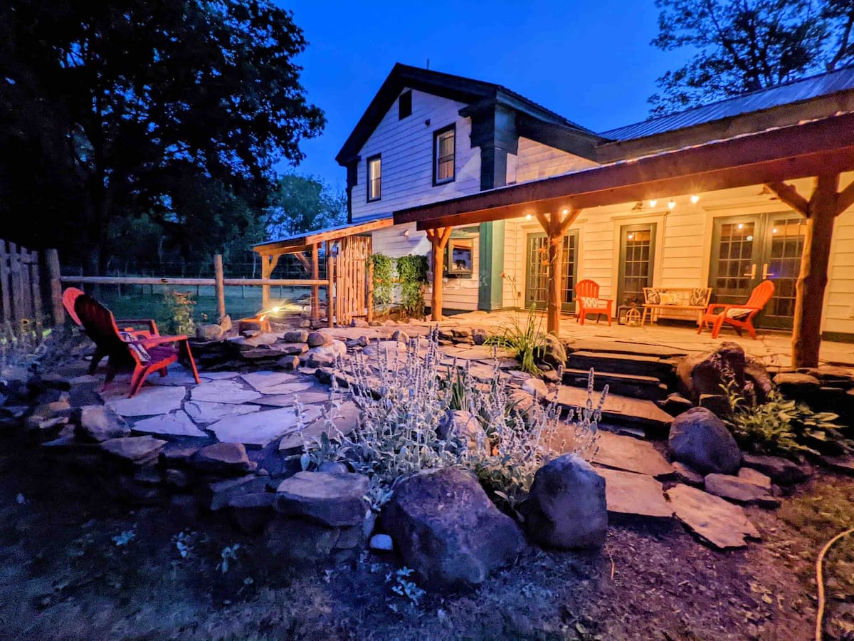 The Huckleberry House, an 1850s farmhouse on a meadow near the Finger Lakes National Forest