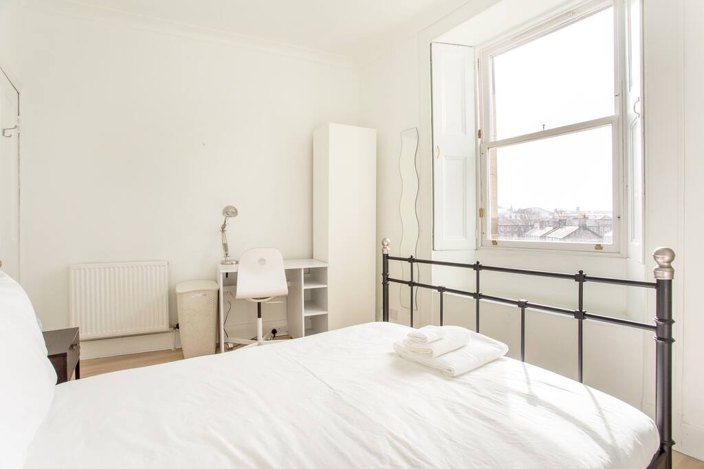 view from the far corner of the master bedroom