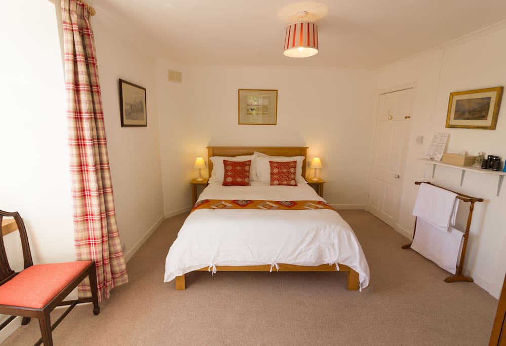 Your light and cosy double bedroom features en-suite facilities and lovely open views towards the Crinan Canal and Knapdale Forest.