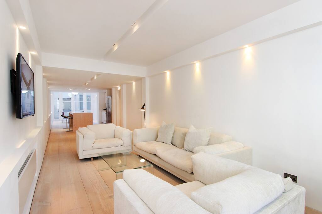 The stunning lounge area looking towards the kitchen and dining area