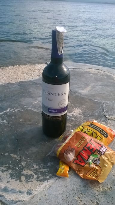 bring your owned wine and in joy beach without any charge..