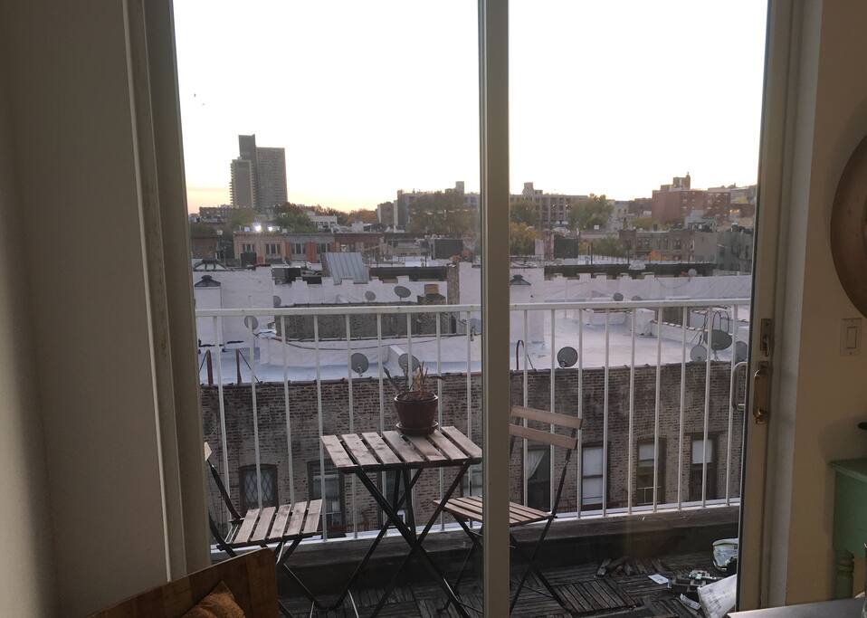 Amazing patio! Perfect for lounging with a glass of wine as the sun sets! Great view of Brooklyn from the top floor of the building.