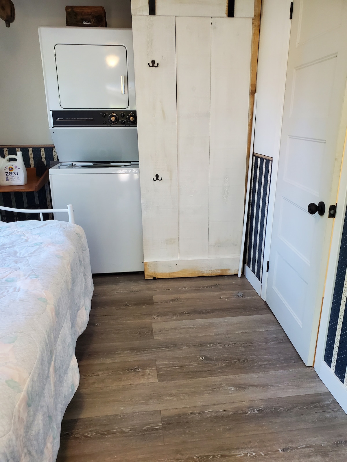 Laundry located behind barn doors