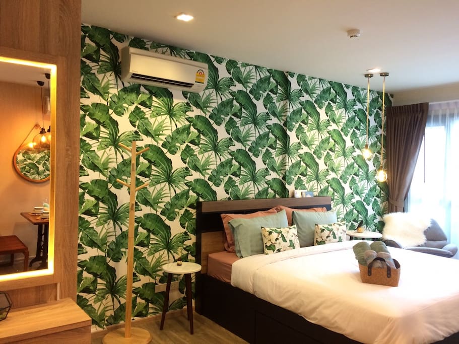 ฺBotanic-designed wallpaper with warm lights to let guest spend the best night in the most relaxing atmosphere