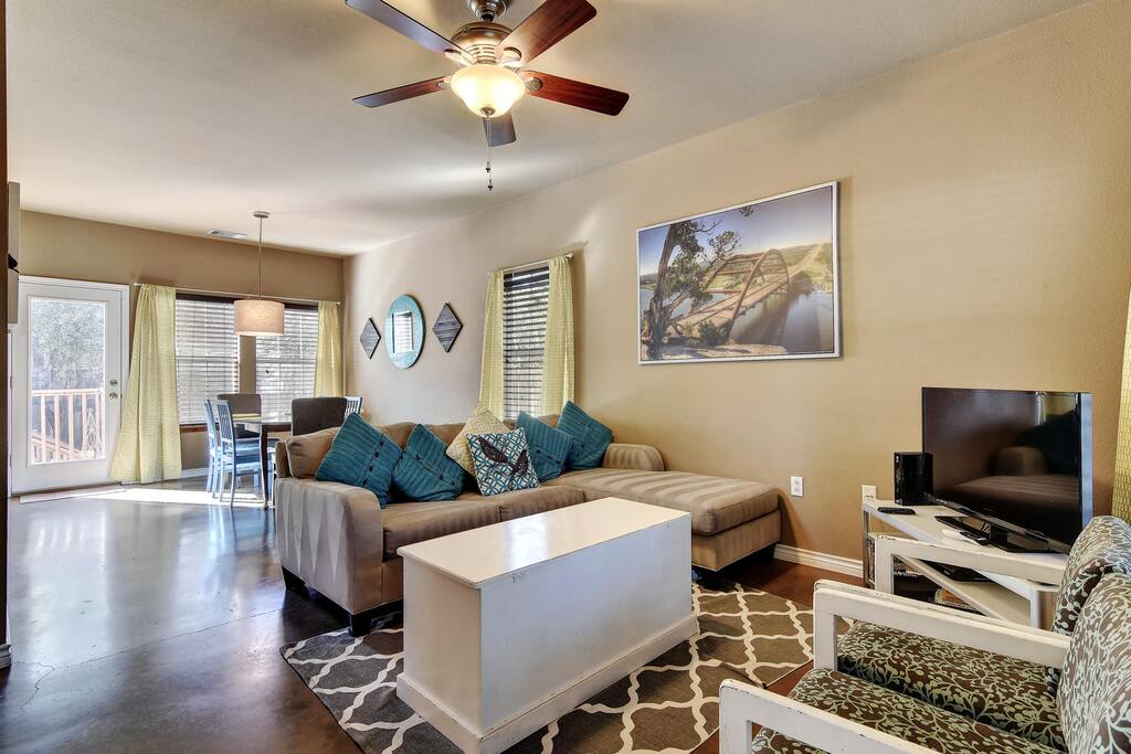Lounge on a queen-size sleeper sofa in front of the flat-screen TV