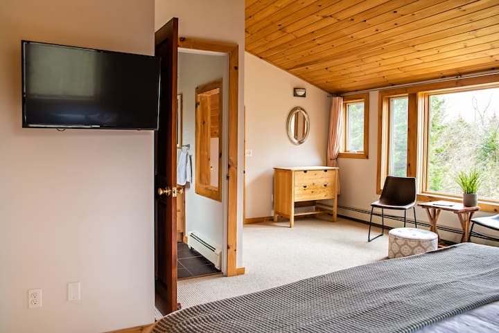Second floor primary bedroom with local mountain views. 