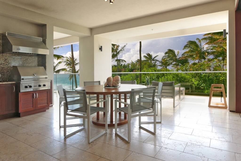 Summer kitchen with top of the line gas grill for fine outdoor dining.
