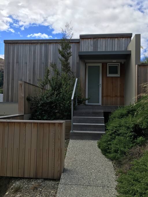 Free standing cedar studio. Walk up the path to your private covered entrance.