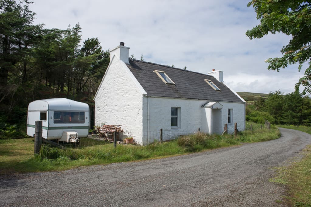 Caravan has parking space next to it
