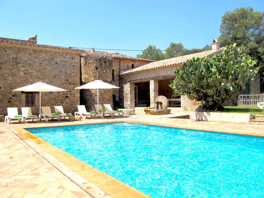 The pool next to the porch and a nice chill out area!