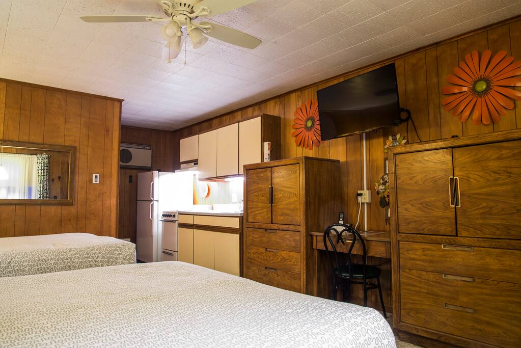 Plenty of storage and notice the ceiling fan in addition to AC.