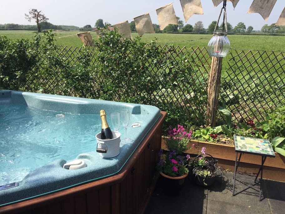South facing garden with private hot tub with views towards Goodwood and Chichester