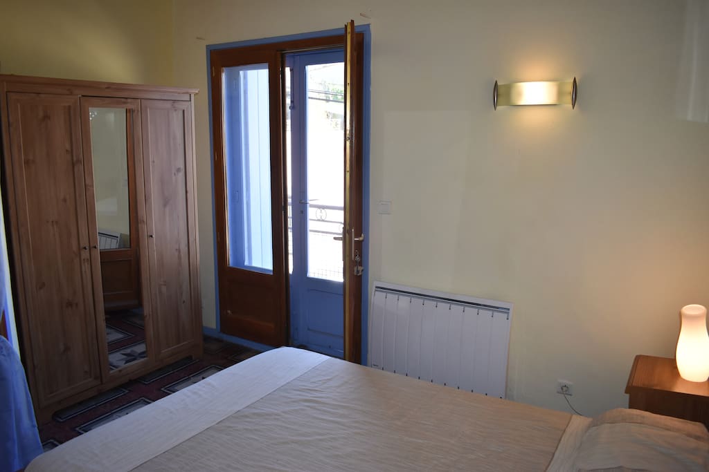 Bedroom with double bed and Juliet balcomy