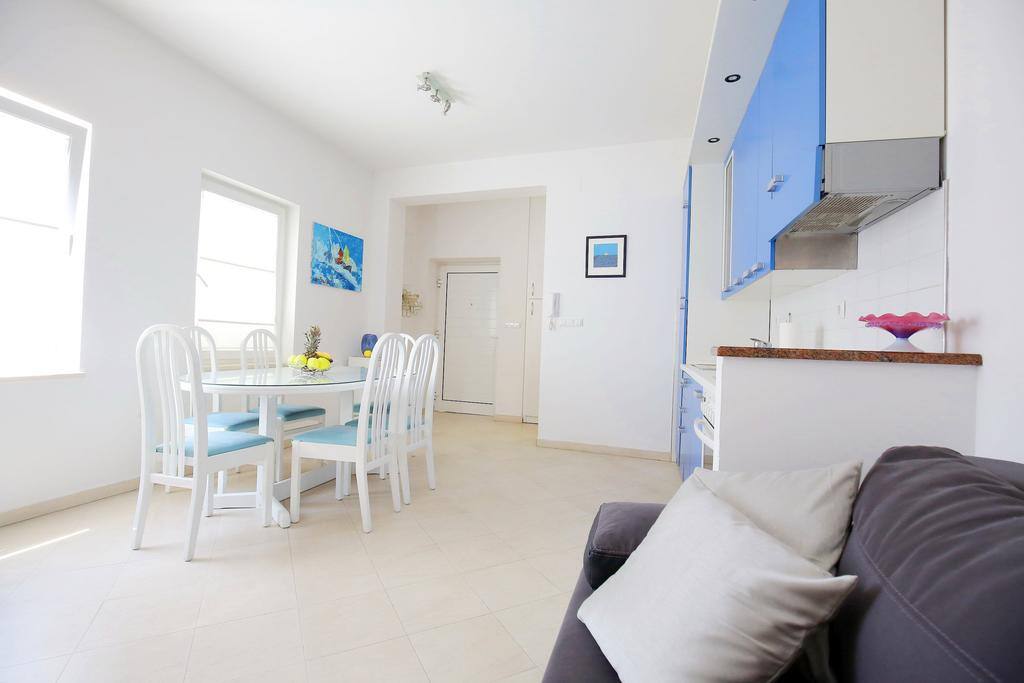 Living room, kitchen, sofa and TV
