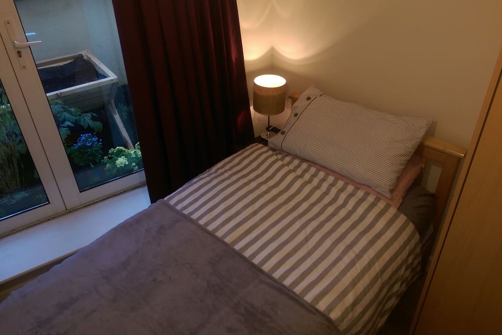 Comfortable single bed and fitted wardrobe, large window to back secure balcony.