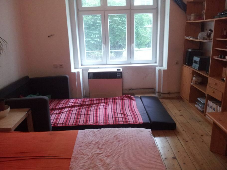 There is one bed in the room, the sofa can be unfolded