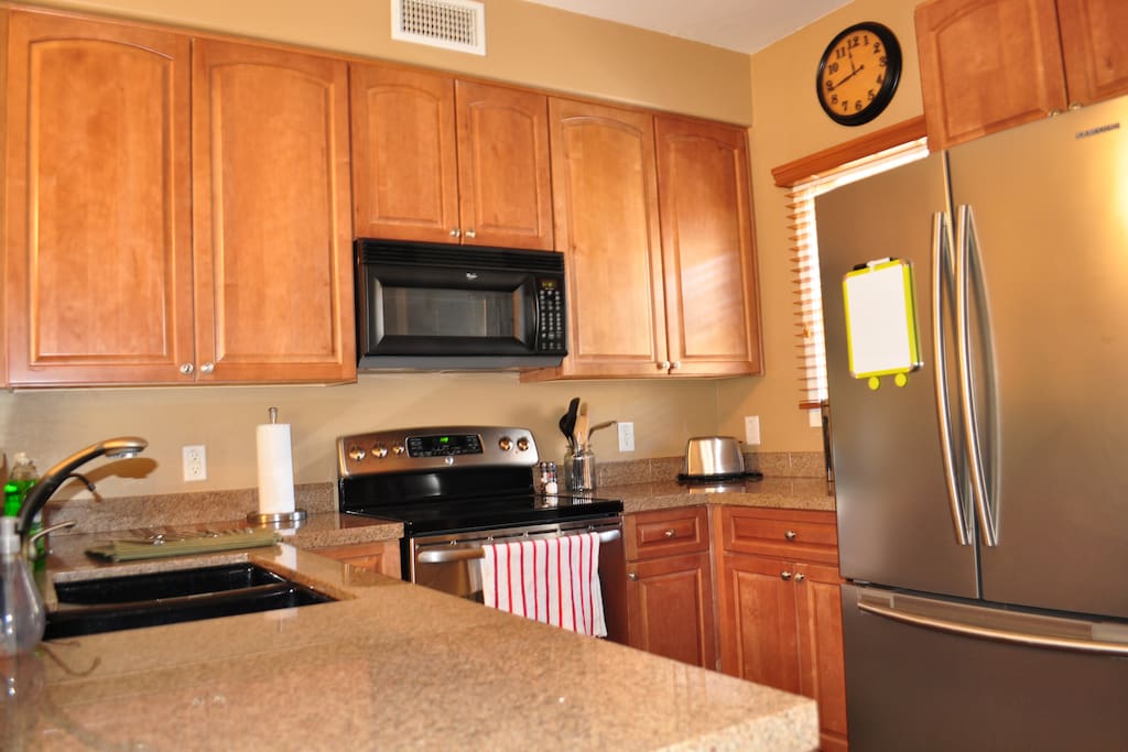 Kitchen with new appliances. All cookware and utensils provided.