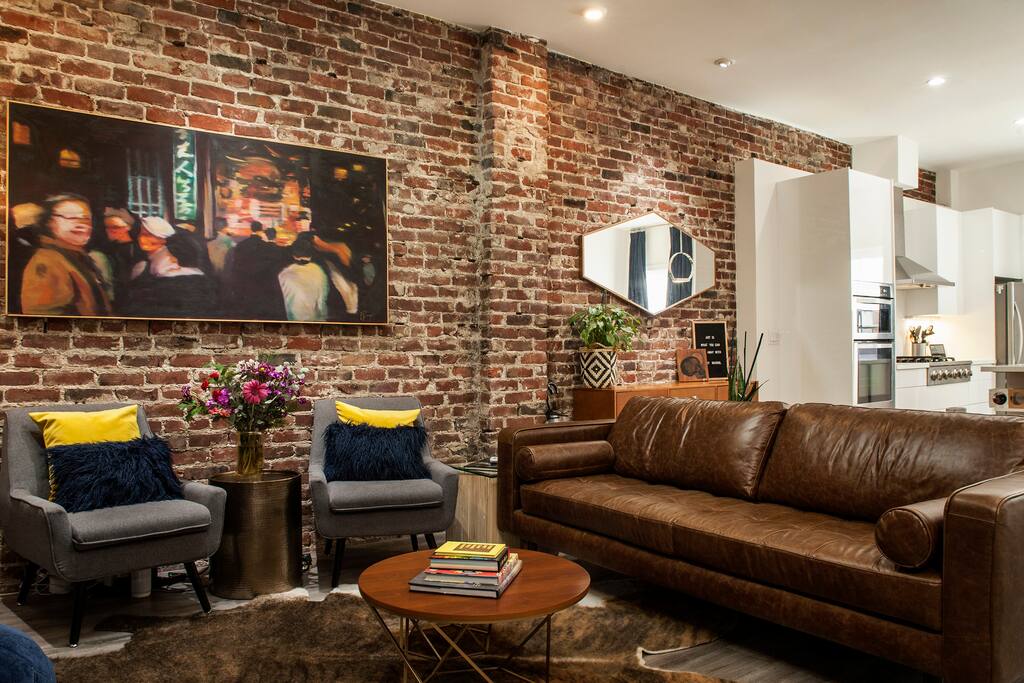 The apt has all brand new furnishings and mid-century modern decor. The faux cow-hide rug is a guest favorite!