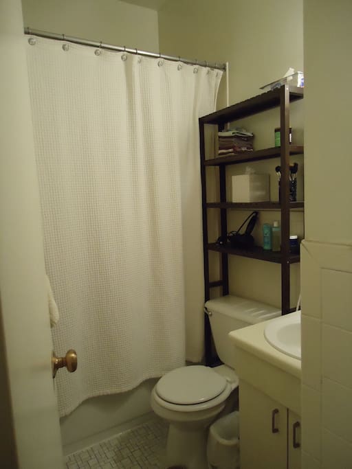 Clean bathroom with basic toiletries.