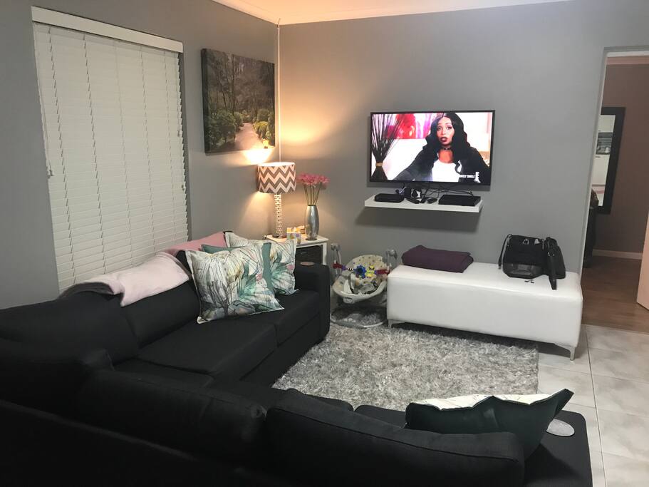 Lounge area with open plan kitchen