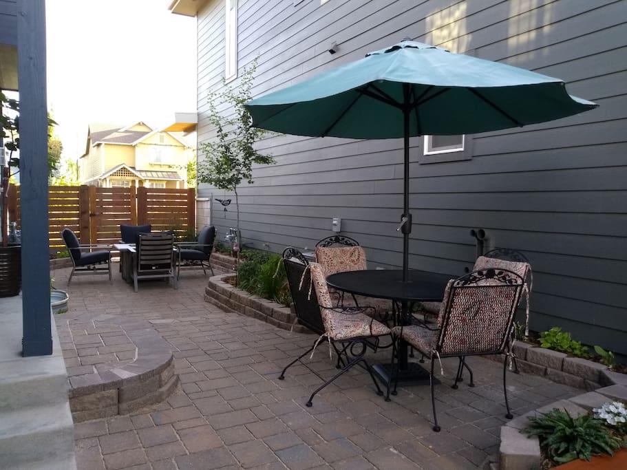 Patio area with eating space and gas firepit